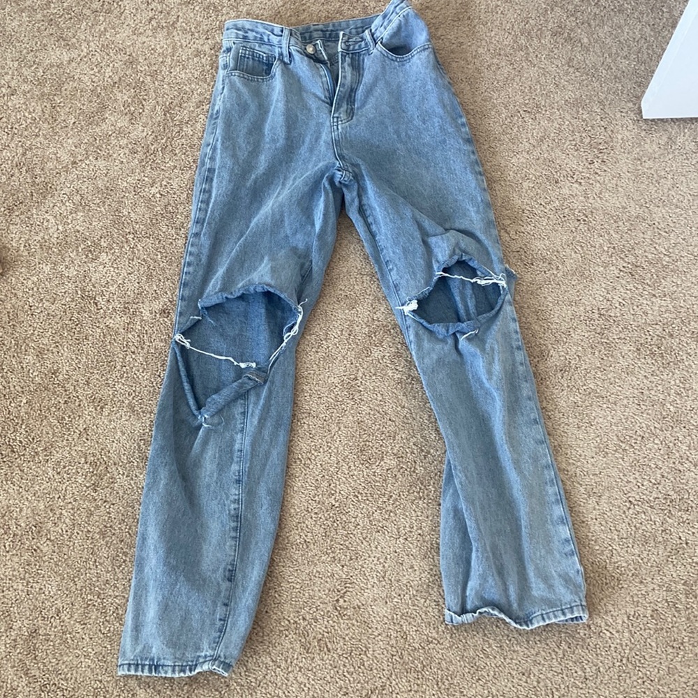 Ripped blue jeans